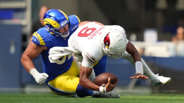 Los Angeles Rams defensive end Jonah Williams (92) sacks Arizona Cardinals quarterback Joshua Dobbs (9) during the first quarter at SoFi Stadium. 